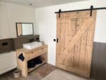 Steigerhouten loft-/schuifdeur met industrieel ophangsysteem