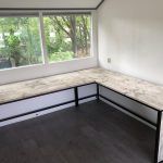 Steigerhouten hoekbureau Rewey met industrieel frame