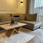 Eikenhouten salontafel Nino met speels onderstel